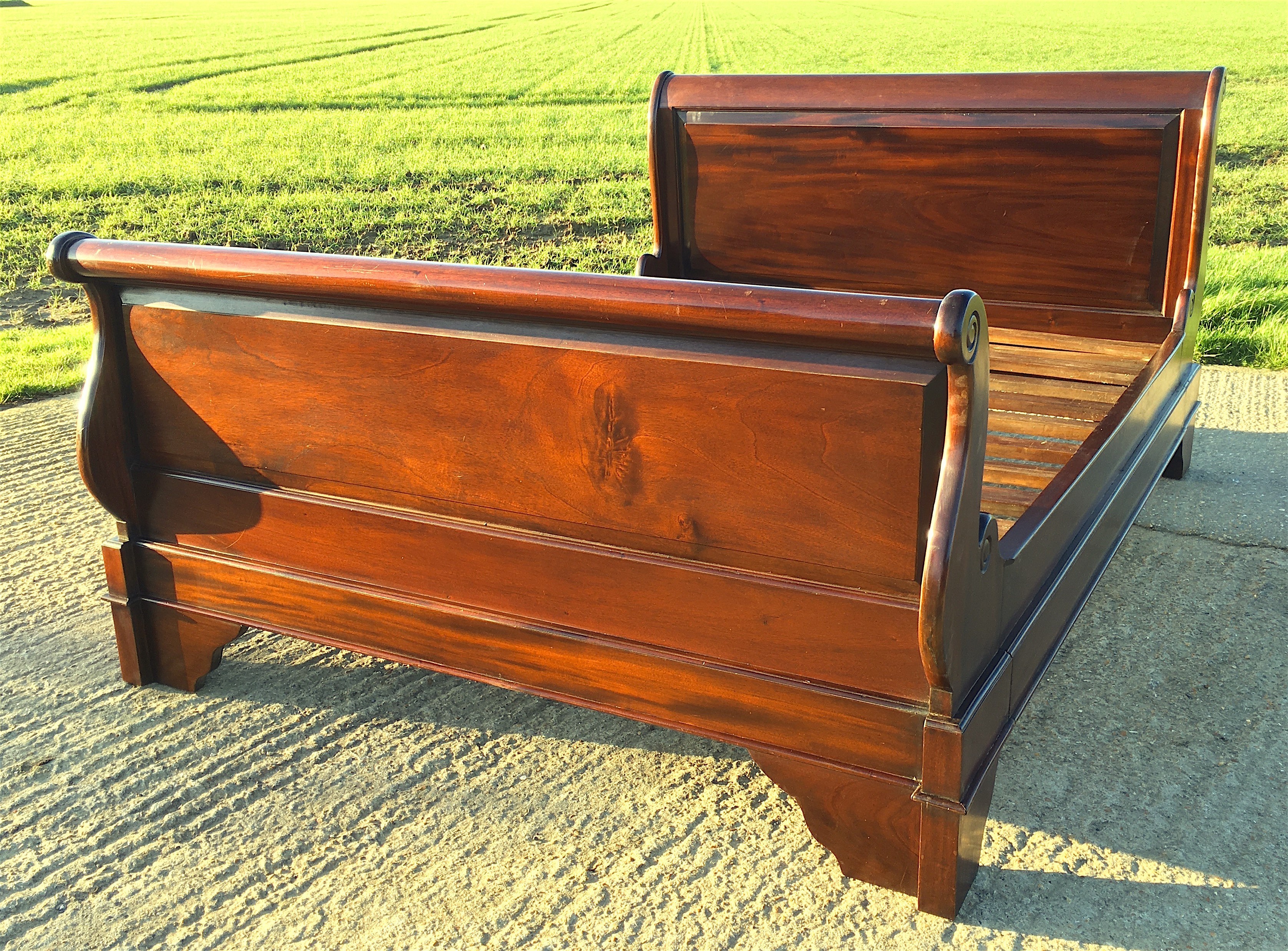 A French style mahogany sleigh bed, length 210cm, width 148cm